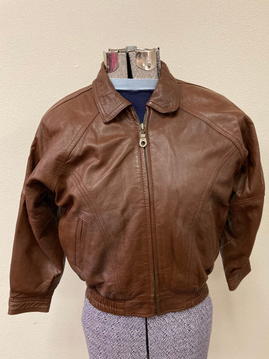 1980's brown leather coat with zipper, displayed on a mannequin size 6 - 8.